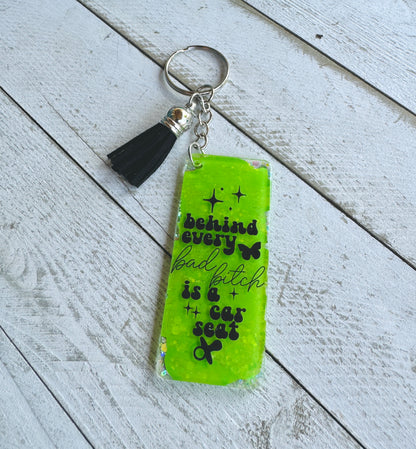 Behind Every Bad Bitch is a Car Seat  Keychain